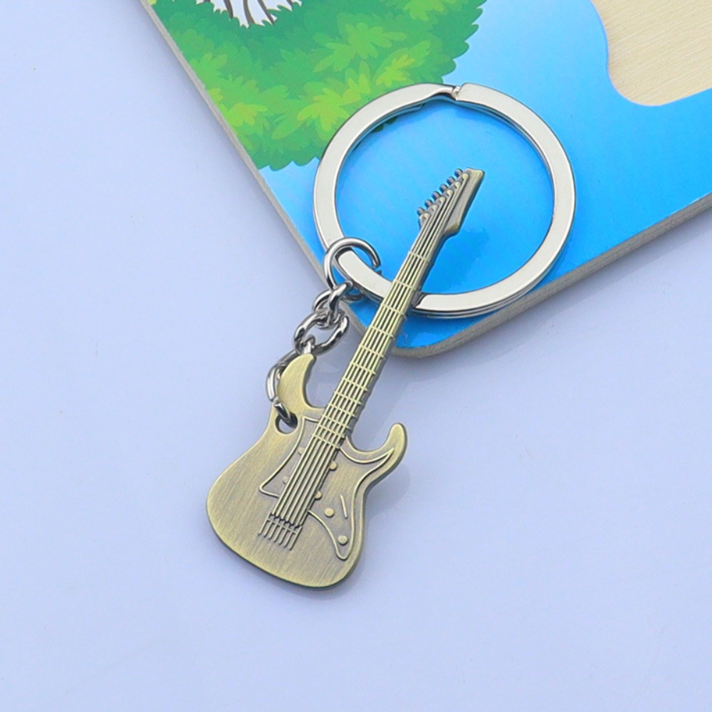Cool Metal Guitar Key Chain Cl - Musical Instruments Cartoon 评论和价格